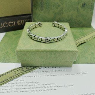 Gucci Engraved GG Twist Cuff Bracelet