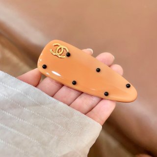 Chanel Orange Acrylic CC Hair Clip – Elegant Luxury Fashion Accessory