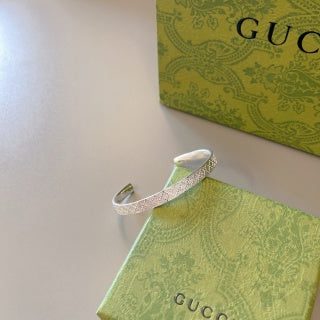 Gucci GG Pattern Engraved Silver Cuff Bracelet