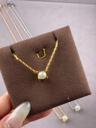 Cartier pearl and horn necklace