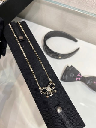Chanel Crystal Bow Pendant Necklace – Elegant Luxury Fashion Jewelry