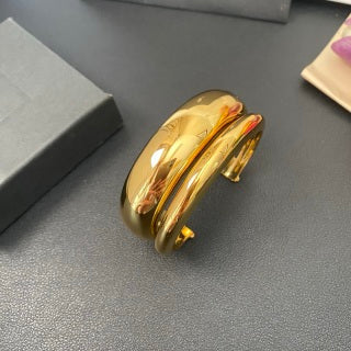 YSL Fluid Gold Sculptural Cuff Bracelet