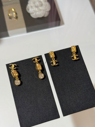 CHANEL Golden Facet CC Charm Stud Earrings