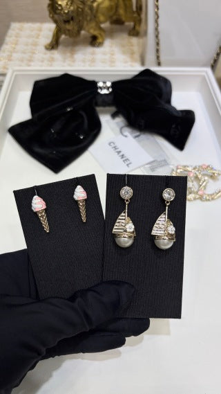CHANEL Pearl Ribbon Drop Stud Earrings