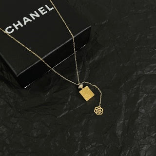 CHANEL Asymmetric Charm Pendant Necklace