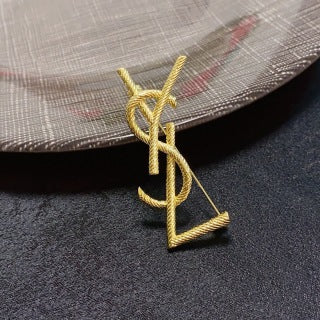 YSL Golden Cassandre Rope Monogram Brooch
