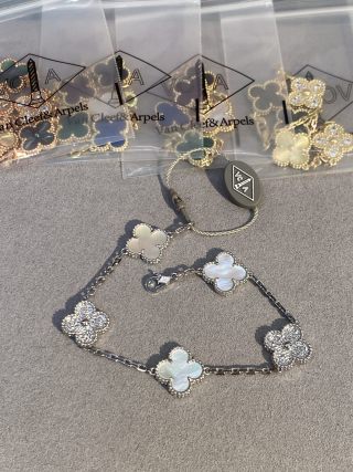 Van Cleef & Arpels 5-Motif Clover Bracelet with White Mother-of-Pearl, Black Onyx, and Gold-Tone Accents