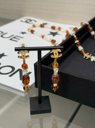 Chanel Amber Pearl CC Drop Earrings – Elegant Luxury Fashion Jewelry