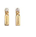 CHANEL Signature Tag Crystal Drop Earrings