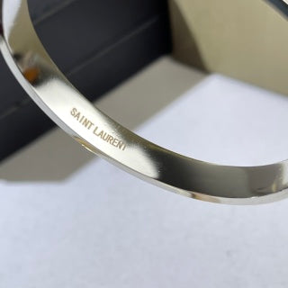 YSL Dual Tone Crystal Emblem Cuff Bracelet