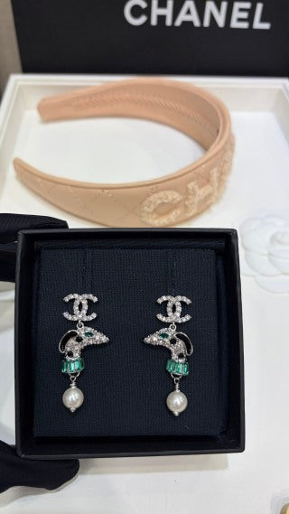 Chanel Silver Pearl Earrings with Dog Motif and Full Pavé Diamonds