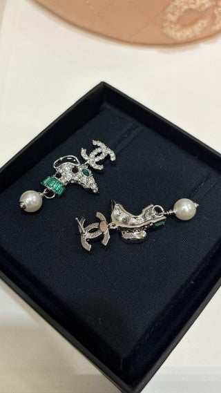 Chanel Silver Pearl Earrings with Dog Motif and Full Pavé Diamonds