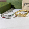 Gucci Interlocking G Web Stripe Trio Medallion Cuff Bracelet