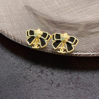 Chanel Camellia black bow stud earrings