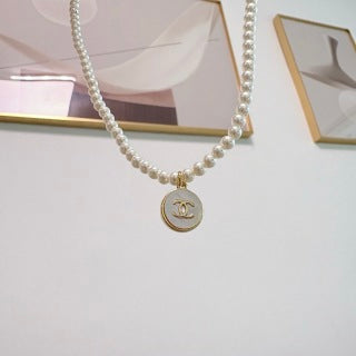 Chanel Pearl Medallion Pendant Necklace