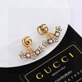 Gucci Interlocking G Crystal Wing Drop Earrings