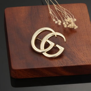 Gucci Interlocking G Double Logo Brooch