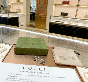Gucci GG Twisted Knot Silver Stud Earrings