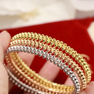 CARTIER Ravelle Studded Orbit Bangle