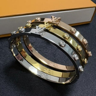 Louis Vuitton Iconic Studded Lock Cuff Bracelet