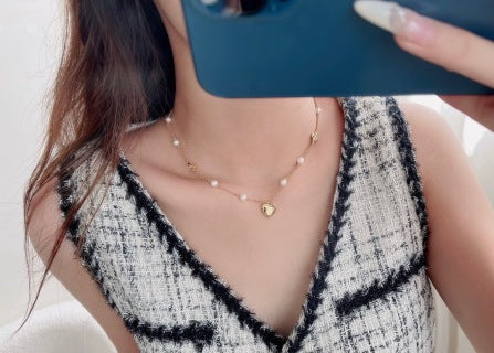 Louis Vuitton Pearl Heart Charm Necklace