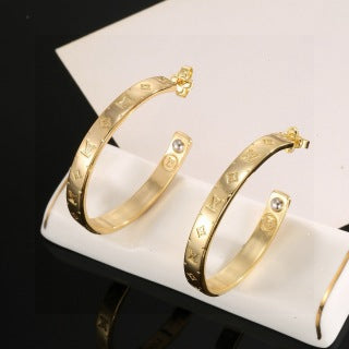 Louis Vuitton Monogram Arc Hoop Earrings