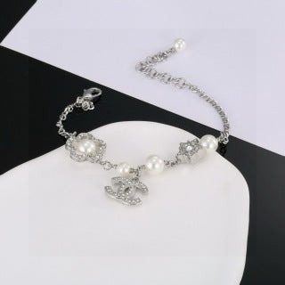 CHANEL Star and Pearl Camellia Bracelet
