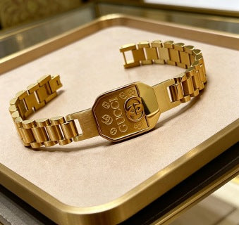 Gucci GG Engraved Buckle Gold Link Bracelet