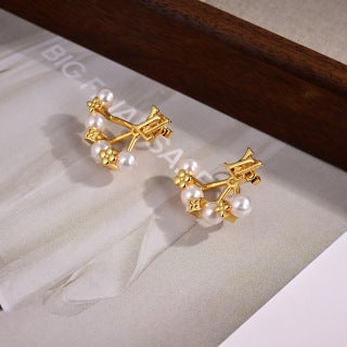 Louis Vuitton Pearl Blossom Star Stud Earrings