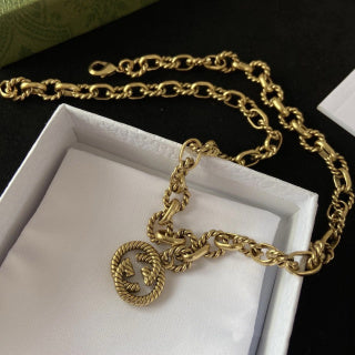 Gucci GG Engraved Medallion Chain Necklace
