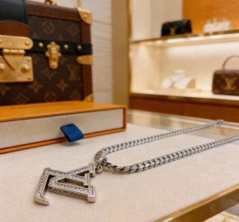 Louis Vuitton Crystal Edge Letter Pendant Necklace